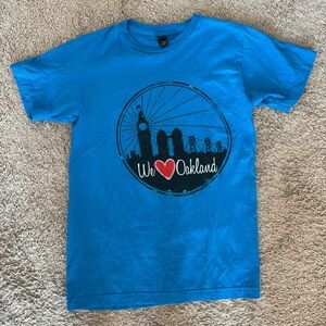 Tulex size‎ small bright blue t-shirt.